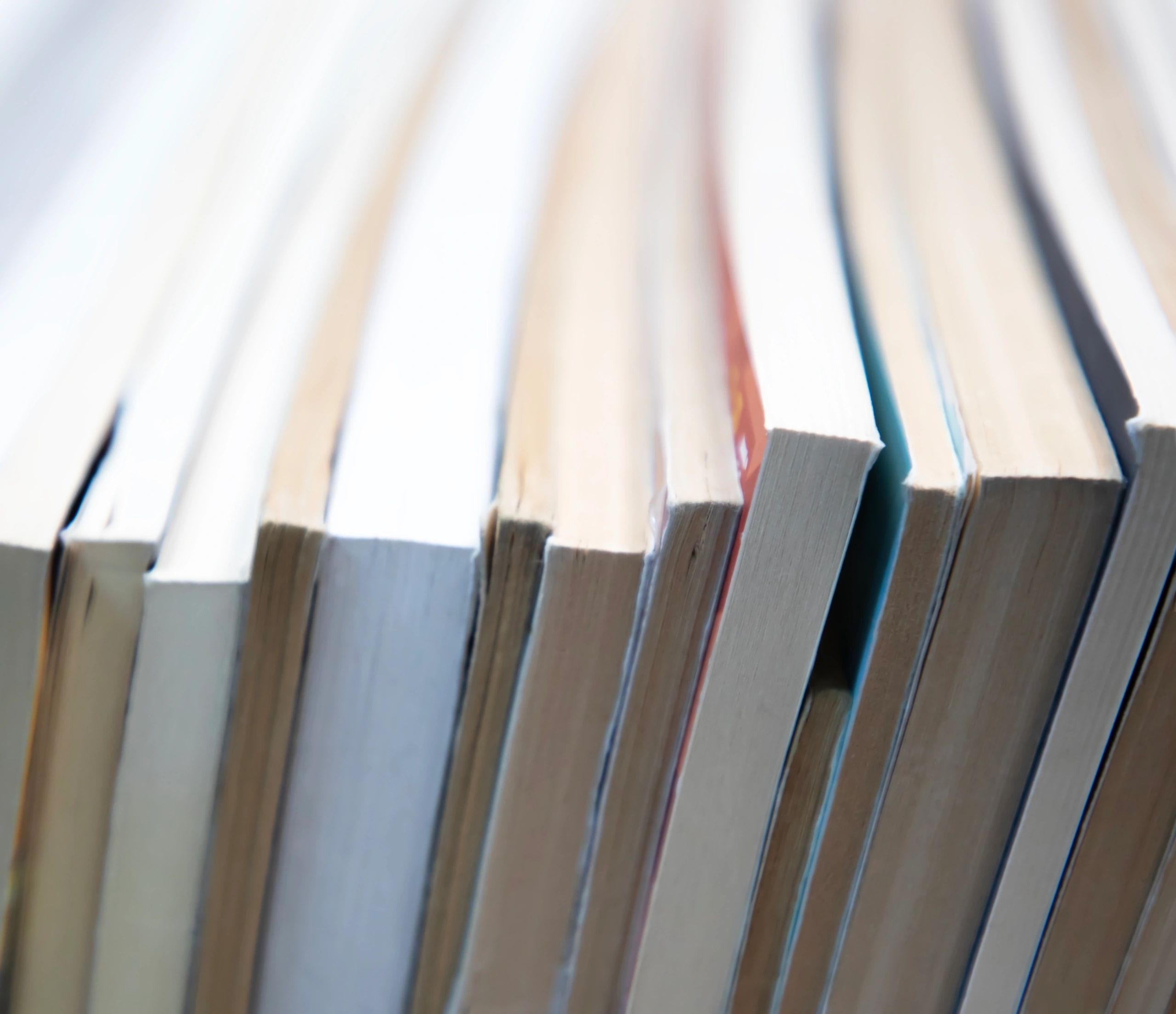 Editorial stack of books with copy space